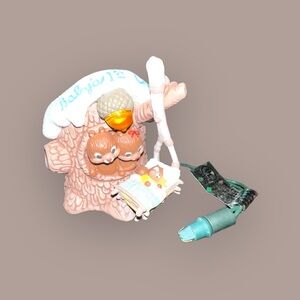 1994 Hallmark Baby's First Christmas Magic Light and Music Ornament